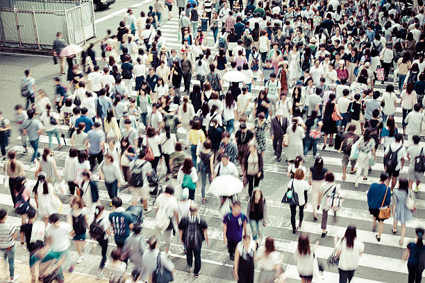 istock Asian People are across the crosswalk 547205652