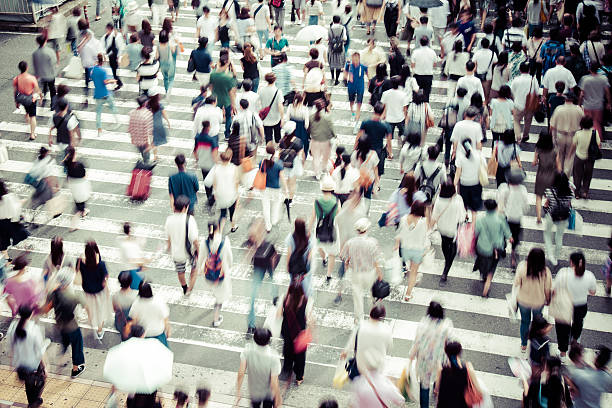 istock Asian People are across the crosswalk 547205734