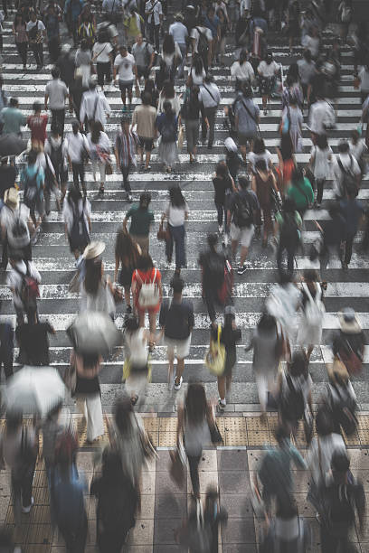istock Asian People are across the crosswalk 547206090