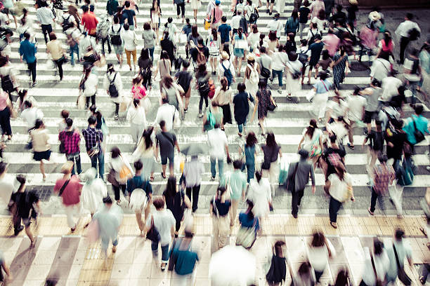 istock Asian People are across the crosswalk 547206194