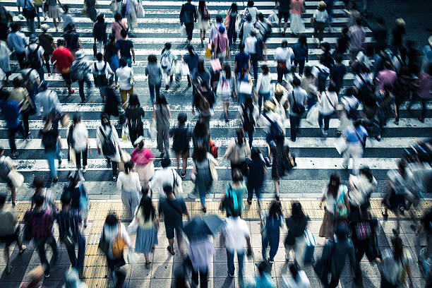 istock Asian People are across the crosswalk 547206218