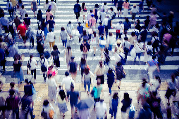 istock Asian People are across the crosswalk 547206238
