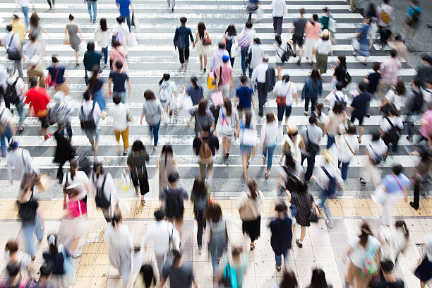 istock Asian People are across the crosswalk 547206278