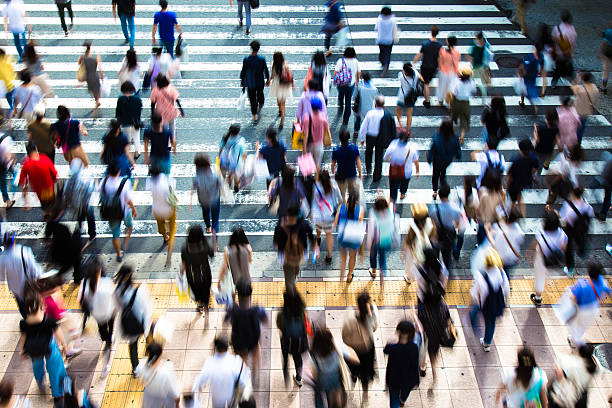 istock Asian People are across the crosswalk 547206296