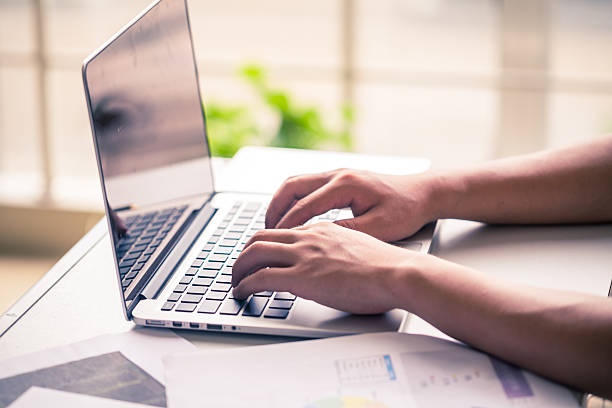 istock business man typing on the laptop in office 547208562