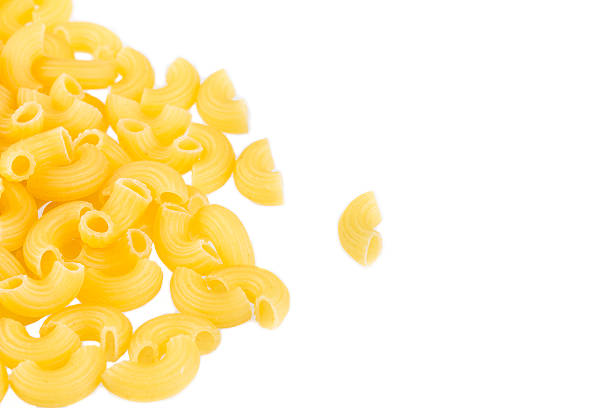 istock Dried pasta or Elbow pasta over white background 547209646