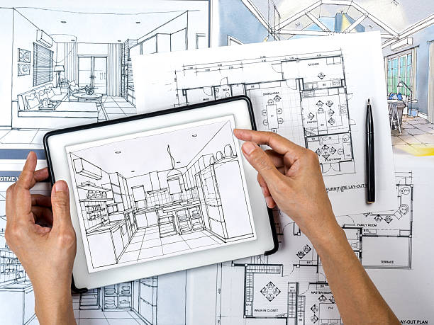 istock Hand touching tablet with blue print on worktable/ business conceptual 547210702