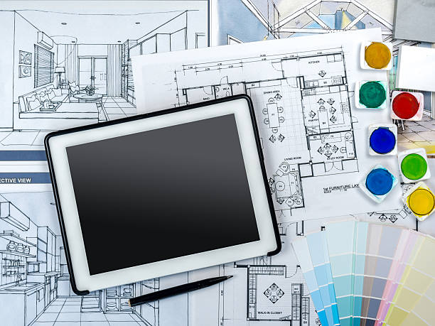istock Tablet on worktable with blue print, sketch/ business background 547210780