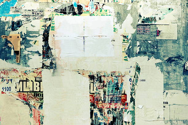 istock Old Urban Street Billboard With Torn Posters And Stickers 547210958
