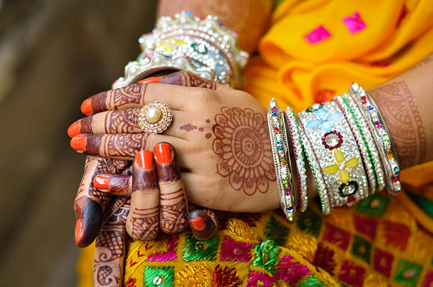 istock Bride henna carved and unique at bride's hand 547211406