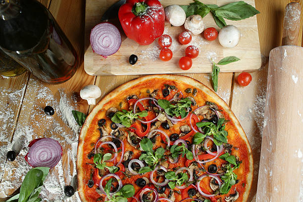 istock Ingredients for cooking pizza on wooden table, top view 547211988