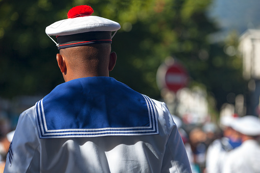 Saint Denis, July 14 2016: 1st Class Quartermaster from the French Navy parading during Bastille Day.