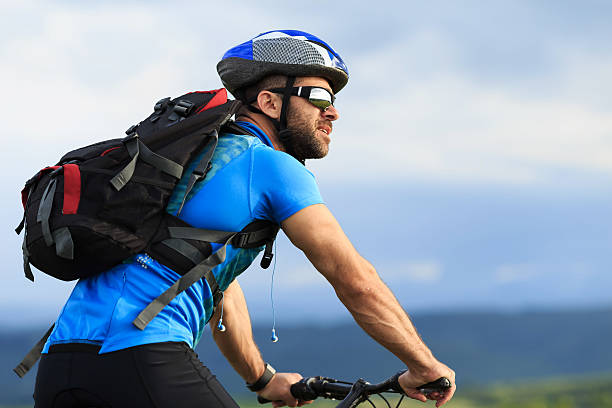 Portrait of young mountainbiker on move