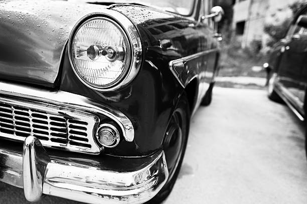 istock Old vintage car headlight close up. 547218542