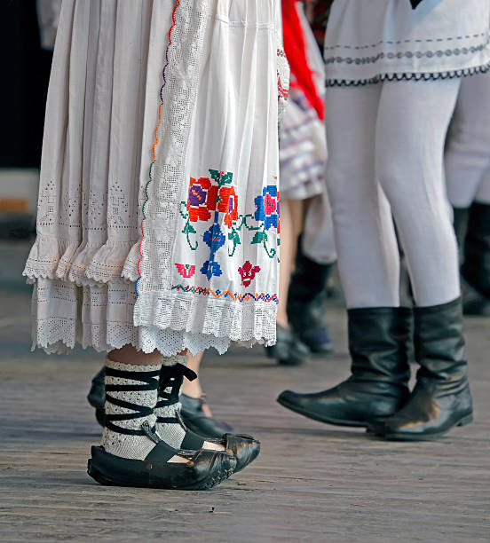 istock Romanian dancers legs in a traditional dance 547218660