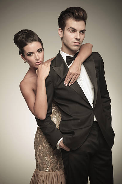 istock Beautiful woman holding her husband from ther back 547219264