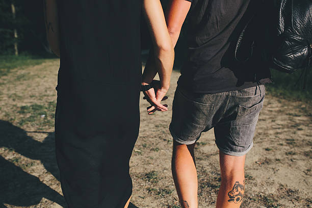 istock beautiful couple standing in a forest 547220360
