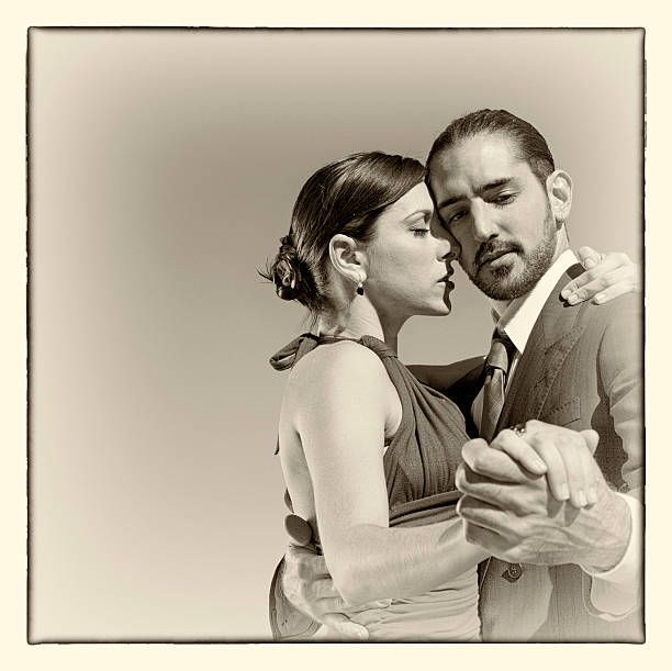 istock Argentine couple dancing tango in Buenos Aires sepia 547221786