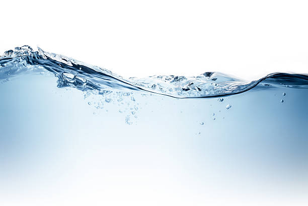 Blue water wave and bubbles to clean drinking water stock photo