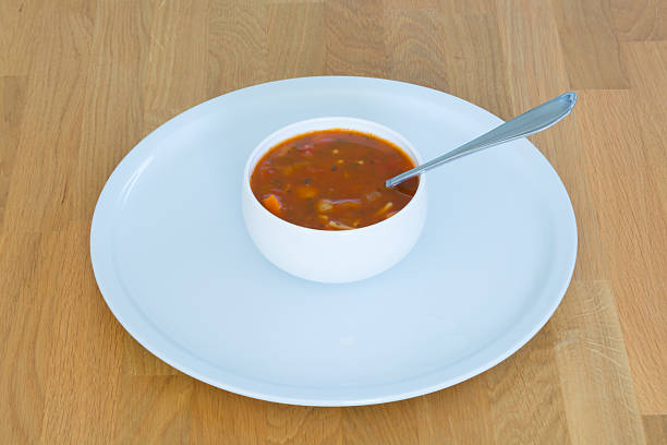 Tomato vegetable soup with meatballs