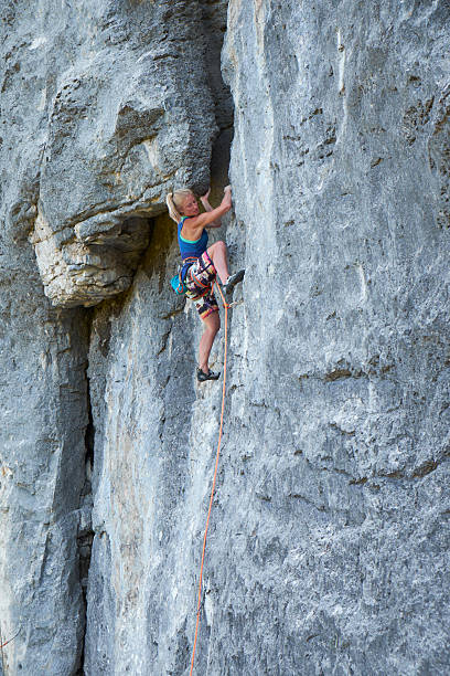 istock girl rock climbing 547226100