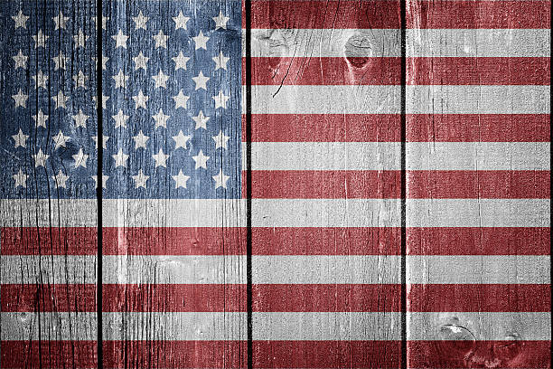 istock USA flag on wood background 547226196