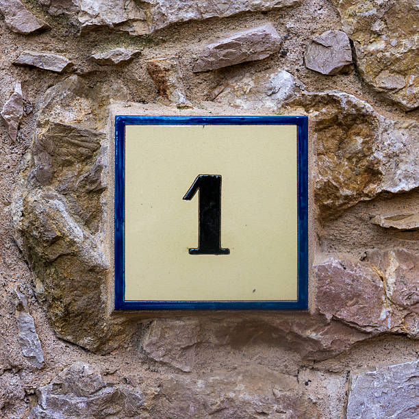 House number 1 house number one on a ceramic tile ceramic tile house numbers stock pictures, royalty-free photos & images