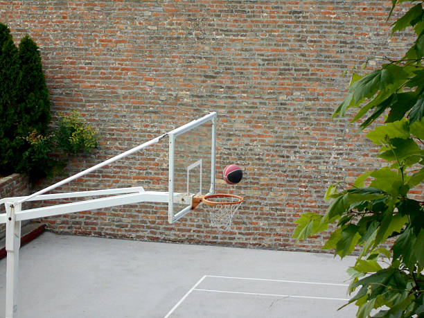 istock Basketball behind the wall 547229118