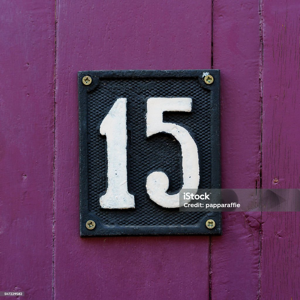 House number 15 House number fifteen made out of cast metal. Number 15 Stock Photo