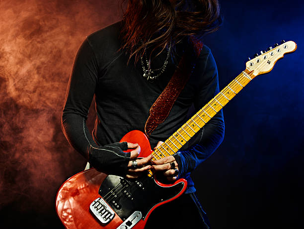 istock The guitarist plays solo. 547230682
