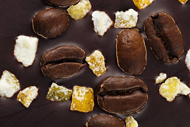 istock Dark chocolate with coffee grains and fruits. 547231186