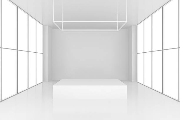 istock pedestal in white room with windows. 3d render 547232458