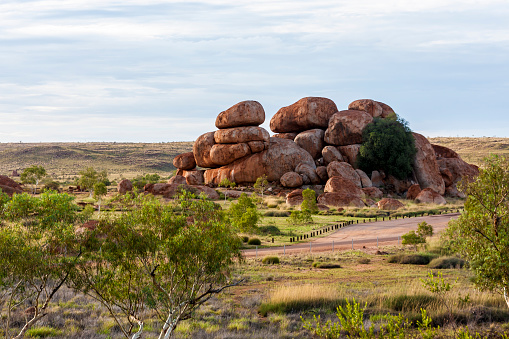 Australia. Outback. The Devils Marbles are huge granite boulders scattered across a wide, shallow valley, 100 kilometers south of Tennant Creek in the Northern Territory.
