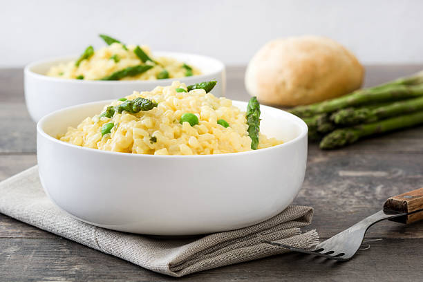 istock Risotto with asparagus, parsley and peas 547235204
