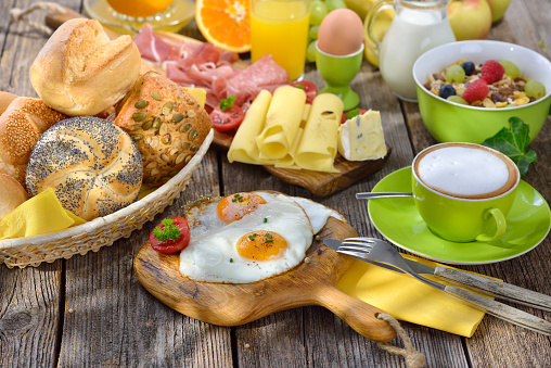 Outside served luxuriant breakfast with fried eggs a wide selection of other foods