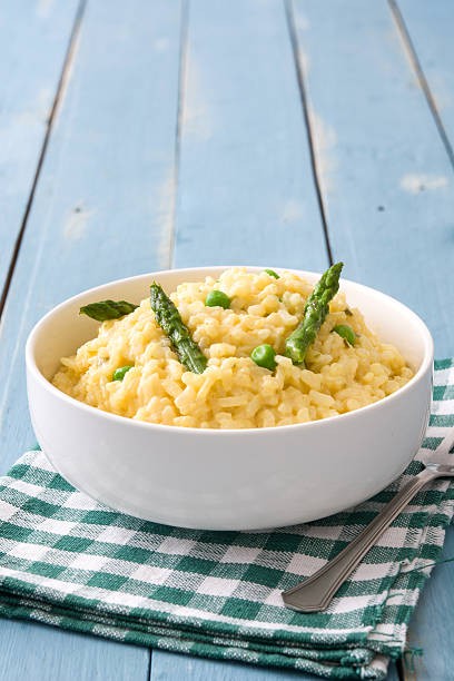 istock Risotto with asparagus, parsley and peas 547236524