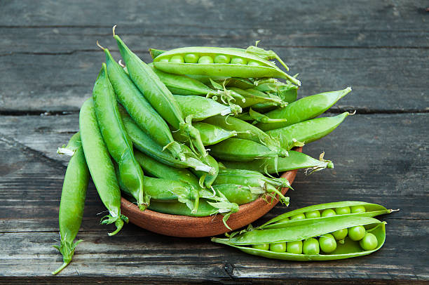 istock raw green peas pods 547239756