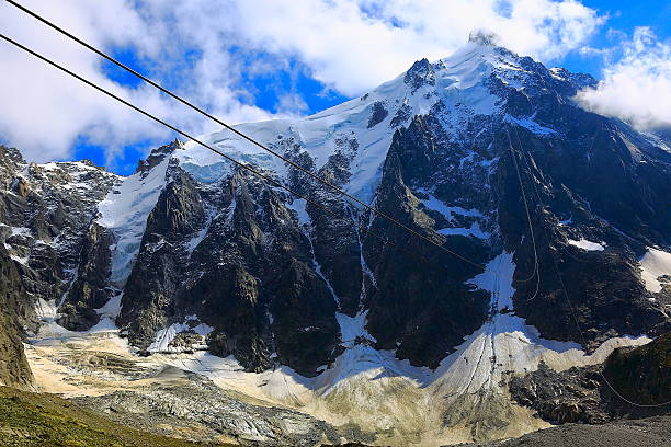 istock Going up to Aiguille Du Midi, Mont Blanc above clouds 547242386