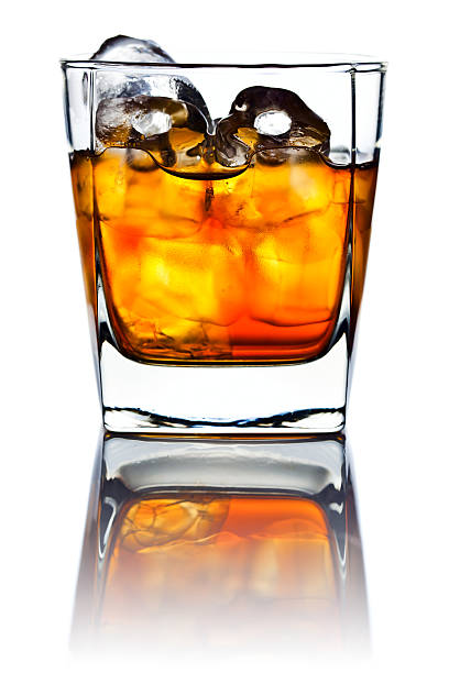 istock Glas of alcoholic drink with ice isolated on white background 547403628