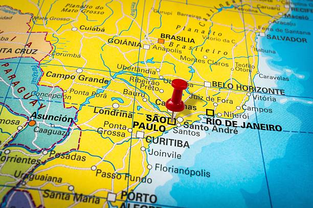 istock Red thumbtack in a map, pushpin pointing at Sao Paulo 547403780