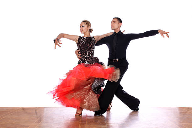 istock Latino dancers in ballroom against white background 547403968