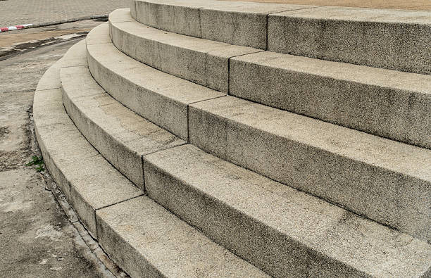 istock Concrete staircase with small gravel 547404016