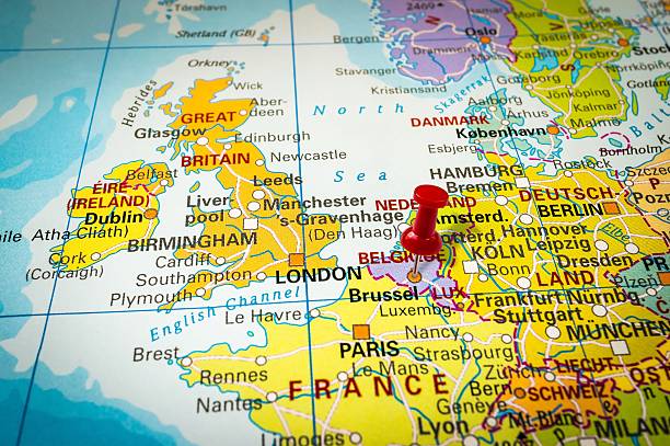 istock Red thumbtack in a map, pushpin pointing at Brussel 547404076