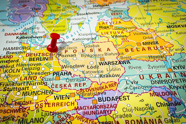istock Red thumbtack in a map, pushpin pointing at Berlin 547404158