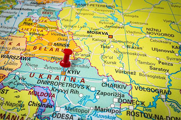 istock Red thumbtack in a map, pushpin pointing at Kiev 547404740