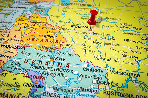 istock Red thumbtack in a map, pushpin pointing at Moscow 547404782