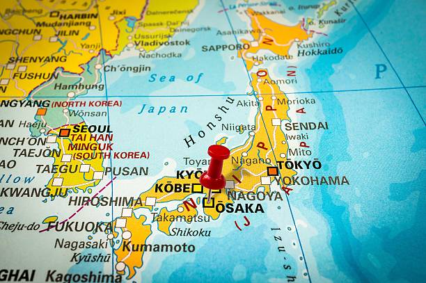 istock Red thumbtack in a map, pushpin pointing at Osaka 547405146