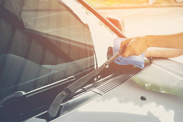istock Cleaning windscreen wiper, picture vintage style 547405728