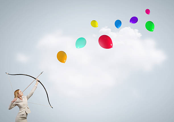 istock Woman aiming her goal . Mixed media 547408430