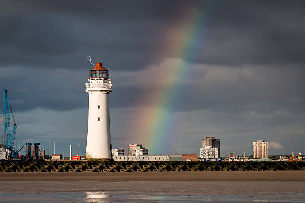 barsch rock leuchtturm und regenbogen - perch rock lighthouse stock-fotos und bilder